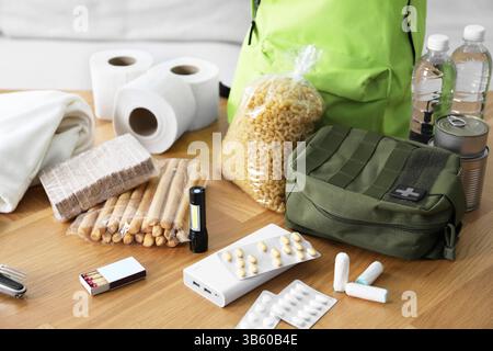 Survival kit. Different emergency supplies on wooden table indoors Stock Photo