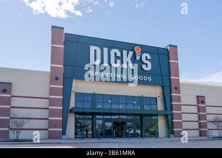 Dick's Sporting Goods store sign on the wall. Stock Photo