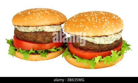 Lamb burger sandwich with fresh salad and mint yoghurt sauce isolated on a white background Stock Photo