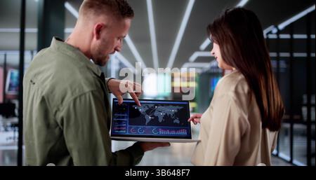 Business Analyst Uses Computer To Analyze Data On Marketing Dashboard. Potential Professions: Business Analyst Stock Photo