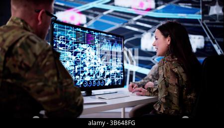 Software Specialist Monitoring Online Surveillance For Military Cyber Security Operations Stock Photo