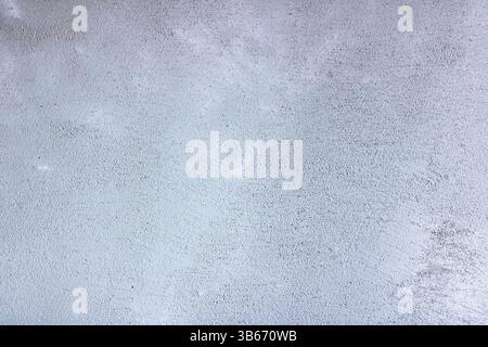 This image features a closeup view that showcases a detailed gray granite texture, highlighting its intricate patterns and colors Stock Photo