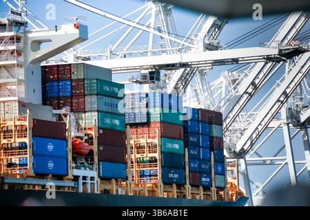 Shipyard Container Vessel Example A view of containers stacked on a ship in Qinzhou Port in southern ...