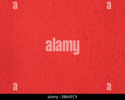 Vivid red textured surface with rich, dynamic color depth creating vibrant background Stock Photo