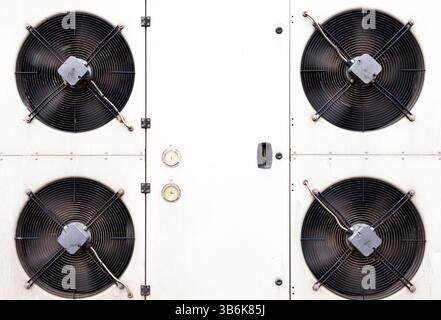 Large industrial air conditioner with four fans. Stock Photo