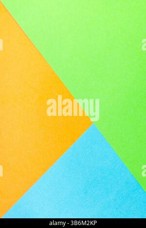 Vivid colors paper creating an abstract geometric composition with orange, green and blue paper sheets, perfect for backgrounds Stock Photo