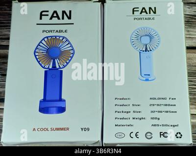 Cairo, Egypt, June 30 2024: portable holding fan, Mini Portable USB Hand Fan, USB Fan high speed, mini USB desktop and Handheld Fan, rechargeable fans Stock Photo