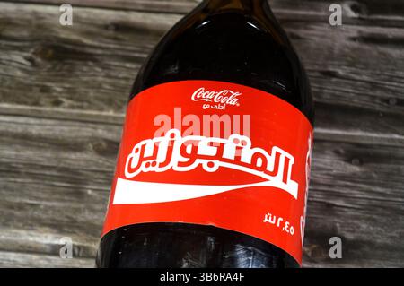 Cairo, Egypt, April 2 2025: Translation of Arabic on the bottle, (Coca ...