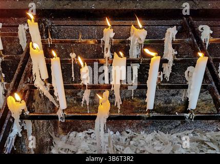 Candles in the wind outside the candle chapel in Kevelaer, Lower Rhine, North Rhine-Westphalia, Germany, Europe Stock Photo