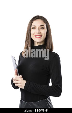 Woman business technology theme. Beautiful young caucasian woman in black shirt posing standing with tablet hands on white isolate background. Profess Stock Photo