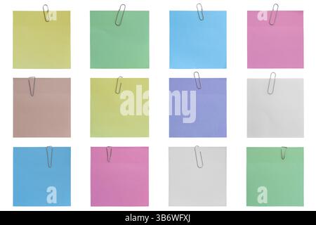 Twelve colorful sticky notes attached with paperclips on a white background, creating a vibrant and organized display. Isolated Stock Photo