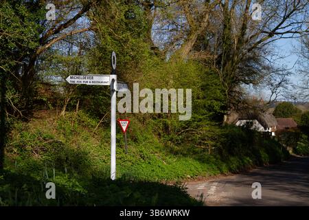 Road sign pointing to Micheldever, the Fox Pub and Restaurant, North Waltham, Hampshire Stock Photo