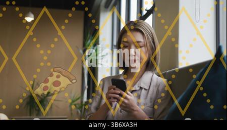 Image of pizza icon and shapes over asian businesswoman using smartphone Stock Photo