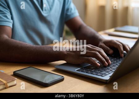 Male Hands Texting on Laptop Stock Photo
