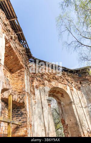 Shot of the vintage, obsolete and partly damaged brick wall of the tomb Stock Photo