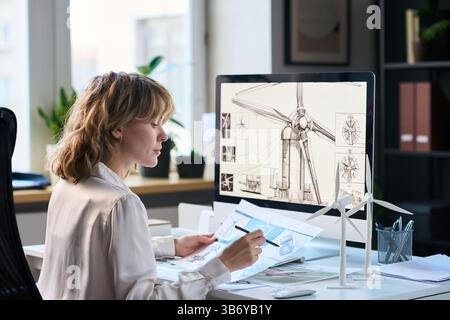 Female Industrial Engineer Working on New Project Stock Photo