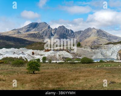 Torrin white marble quarry workings with Black Cuillin mountains beyond, Isle of Skye, Scotland, UK Stock Photo