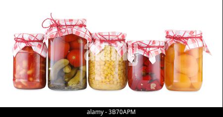 Many jars with different pickled products isolated on white Stock Photo