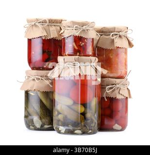 Many jars with different pickled products isolated on white Stock Photo