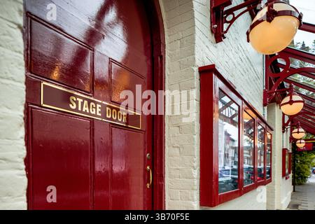 Close-up of a red theatre stage door. Stock Photo