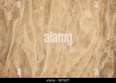 A Unique Beige Textured Background Perfect for Various Design Projects and Artistic Endeavors Stock Photo