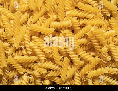 Dry Rotini Egg Pasta Background Stock Photo