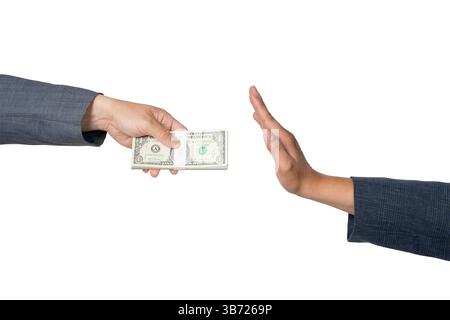 Hand gives money to the other hand. Anti-corruption concept. Businessman refuses money given by a man. Anti-bribery and corruption concept. Isolated w Stock Photo