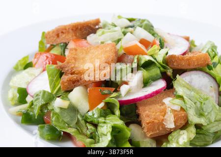 Fattoush salad, Traditional Lebanese Salad isolated on white background Stock Photo