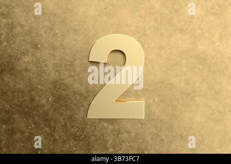 Golden number two standing on a textured golden background, representing concepts such as second place, counting, and numerical order Stock Photo