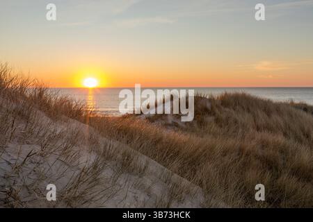 Sunset at North Sea beach  of Vejers Strand, Denmark, view from the dunes Stock Photo