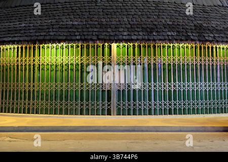 Steel doors stretch Backgroud with Old Wood Roof. Stock Photo