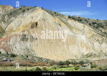colourful slope erosion of "Calanchi" (Badlands) along the Simeto River in Sicily, Italy Stock Photo
