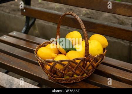 Basket full of fresh ripe lemons close-up Stock Photo