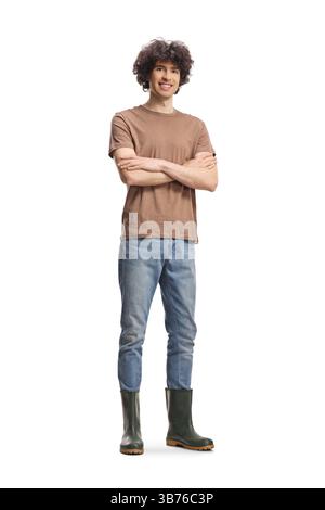 Guy wearing garden rubber boots isolated on white background Stock Photo