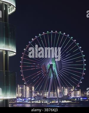 The big wheel provides entertainment and promotion opportunities in multiple colours Stock Photo