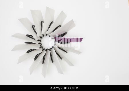 Propeller of white and color envelopes on the white table Stock Photo