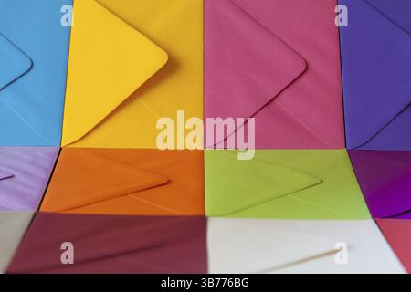 Different colored envelopes on the table. Composition with envelopes on the table Stock Photo