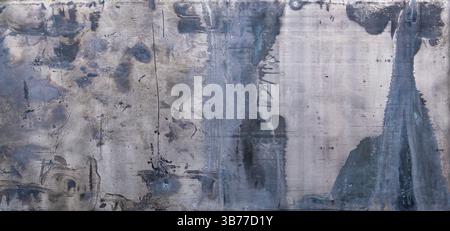 Abstract grunge texture with weathered lead metal patterns in shades of grey and blue, panoramic view. Stock Photo