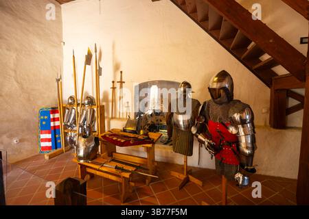 Historical armor and weapons showcased in Celje Castle, Slovenia Stock Photo