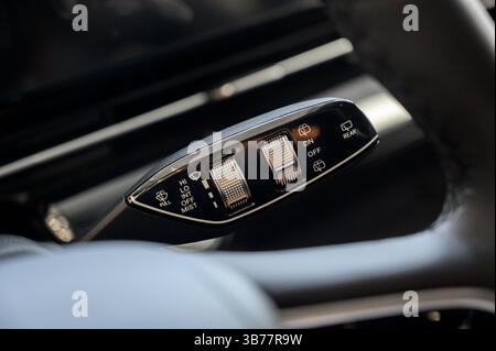 Close up view of car light switch control. Headlight switch, turn signal lever, and fog light switch Stock Photo