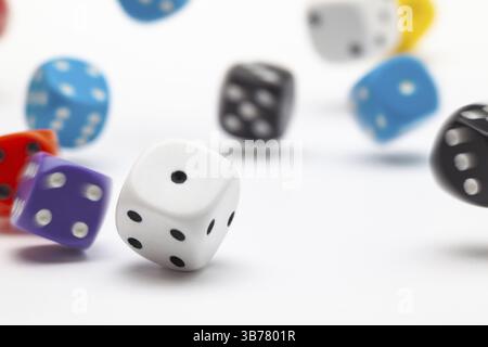 White dice on the white table. Playing dice at white wooden background. Playing a game with dice. Risk concept Stock Photo