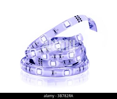Led violet stripe in coil isolated on white.Diode glowing strip. Stock Photo
