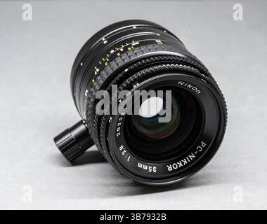 Gothenburg, Sweden - October 13 2023: Nikon PC-Nikkor 35mm shift lens on grey background Stock Photo