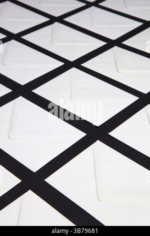 Composition with white envelopes on the table. The photo suitable for various holidays and anniversaries Stock Photo