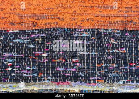 The close up details of a colorful rag rug Stock Photo