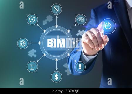 Building information modeling. Man using virtual screen with abbreviation BIM and different icons, closeup Stock Photo