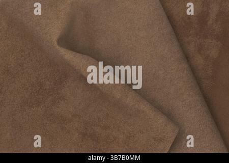 a genuine leather mocha mousse tones, pantone color, background picture, color of the year Stock Photo