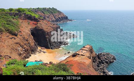View of the rocky cliff and sunset point at Devghali, Kaseli Beach, Ratnagiri, Maharashtra, India. Stock Photo
