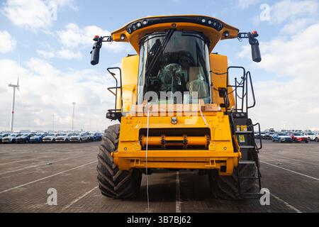 New yellow heavy bulldozer without bucket parked on the site. Stock Photo