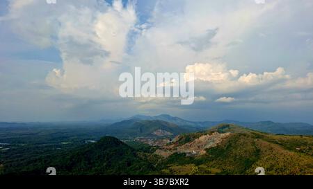 beautiful view on Manjai Hill, Banjarbaru, with green hills, beautiful bright blue sky Stock Photo